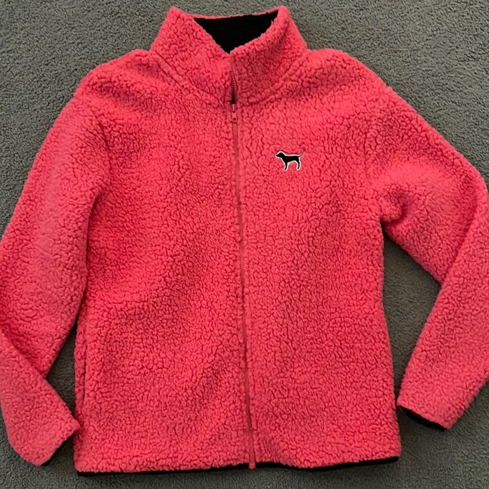 Never been worn Sherpa Pink zip up. Stay warm this winter